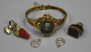 A Victorian gold hinged bangle with inset portrait miniature, a seal and pendant etc.