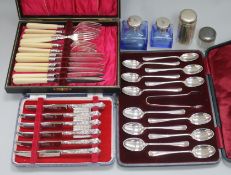Three cased silver cutlery sets and two scent bottles