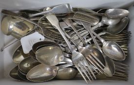 A matched part service of fiddle pattern silver flatware, various dates, makers and crests, Georgian