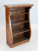 A William IV rosewood open bookcase, of bombe form, fitted with three adjustable shelves, W.2ft 3in.