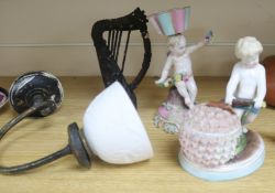 Two cherub figurines, a candlestick and a trinket box, a ceramic shaded lamp and a harp