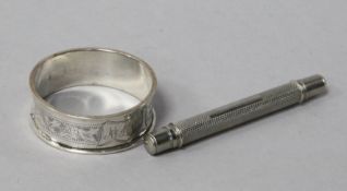 A Perry & Co, London patent cased pencil and a silver napkin ring.