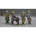A Sitzendorf porcelain Turkish four-piece band and a 19th century Continental Commedia dell'Arte
