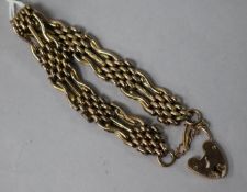 An early 20th century 9ct gold fancy gatelink bracelet, 17.2 grams.