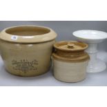 A Victorian white glazed ham stand and two Victorian earthenware jars