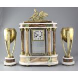 Louis Carvin. An Art Deco bronze and marble clock garniture, comprising four glass clock and pair of