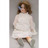 An Armand Marseille 390 A 12 M bisque head doll