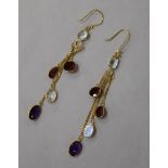 A pair of 14ct gold garnet, moonstone and amethyst drop earrings, 5cm.