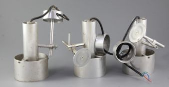 A set of three Peter L›vig Neilson aluminium wall lights, height 6.5in.