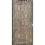 A Talish multi-coloured rug, c.1840, with field of fifteen polygons and three row border, 7ft 2in by