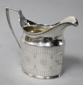 A George III engraved silver cream jug, probably by Soloman Hougham, London, 1803, 10cm, 4 oz.