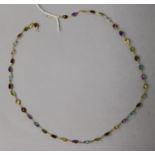 A 14ct gold and multi gem set spectacle necklace, 52cm.