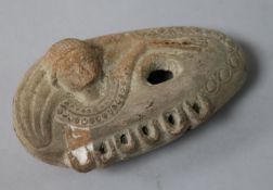 A Roman or later terracotta oil lamp, modelled as a Goddess