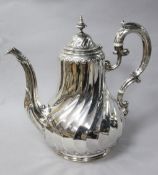 A French 950 standard silver wrythen fluted coffee pot, gross 20 oz.