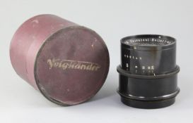 A Voigtlander Braunschweig Universal-Heliar 1:4,5.F=36cm camera lens, numbered 571859, in original
