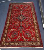 Small red ground rug 185 x 96cm