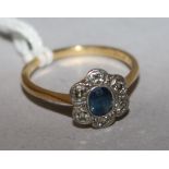 A 1920's 18ct gold and platinum, sapphire and diamond cluster ring, size N.