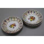 A set of five Meissen circular fruit painted dishes