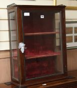 A mahogany wall mounting china display cabinet