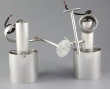 A pair of Peter L›vig Neilson aluminium wall lights, height 8in.