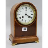 An Edwardian arched mantel clock