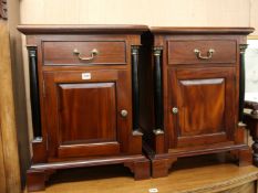 A pair of bedside cupboards H.65cm