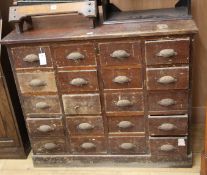 A chest of twenty drawers W.108cm