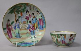 A Cantonese porcelain tea bowl and saucer, with gilt painted European monograms