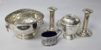 A modern silver rose bowl, a planished silver mug and cover, a pair of silver dwarf candlesticks and