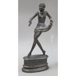 An Art Deco pewter alloy figure of a lady