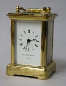 A Matthew Norman miniature carriage clock