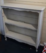 A Louis XV style painted low open bookcase W.100cm