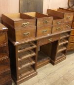 A nine drawer desk W.138cm