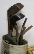 Two wooden drivers by Armstrong & Co and Paxton, a gun metal putto signed Jacques, 7 other and a