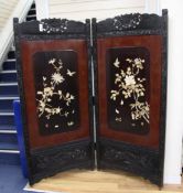 A Japanese shibayama style inlaid lacquer two fold screen, late 19th century, the panels decorated