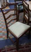 A set of six Chippendale style mahogany ladder-back dining chairs