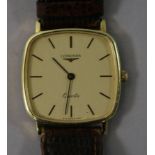 A gentleman's gold plated and steel Longines quartz watch.