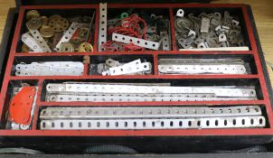 A collection of cased meccano