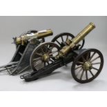 A model cannon and gatling gun