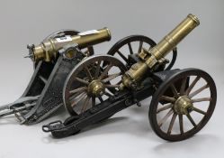 A model cannon and gatling gun