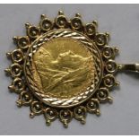 A Victorian 1899 gold sovereign in pierced 9ct gold mount on a 9ct gold suspension chain.