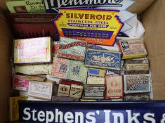 A collection of advertising pen and pen nib and a Stephen's ink shelf sign