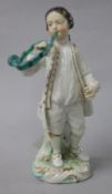 A Derby porcelain figure of a boy with trumpet