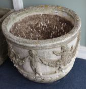 A pair of composition urns W.65cm