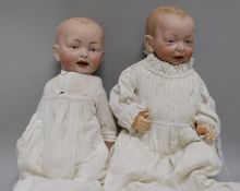 A Kammer & Reinhardt bisque head character doll, no. 36 and a similar doll, impressed marks G,