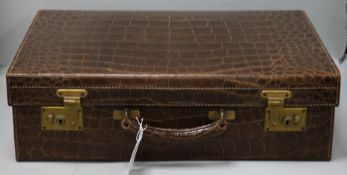 A crocodile suitcase 1920's-30's