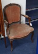 A pair of 19th century French walnut fauteuils
