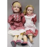 An Armand Marseille A 10M doll and a Schoenau & Hoffmeister doll 1909