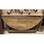 An 18th century oak oval topped gateleg table, W.120cm