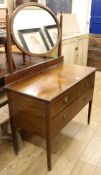 An Edwardian inlaid mahogany dressing table and matching cupboard W. 107cm dressing table, W.84cm